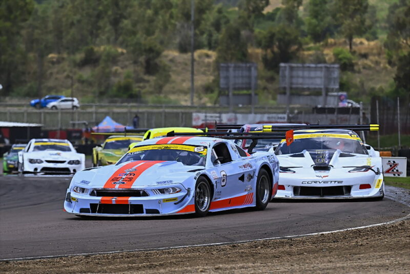 Warren Lombard (Pepboys Automotive Ford Mustang) and Thomas Reib (Café 9 Automotive Chev Corvette) fought for the year’s Dunlop V8 Supercars title, with the laurels going to Lombard. Photograph: Dave Ledbitter